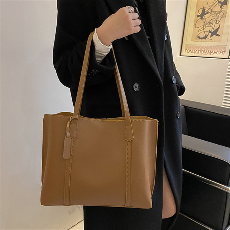 กระเป๋าโท้ทหนังเทียมสีดำคลาสสิ - Leatherwork Wallet บทวิจารณ์และราคา